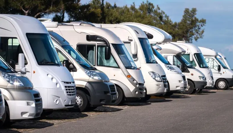 Row of RVs parked on a lot